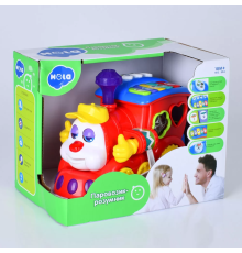 Гра 556 паровоз, сортер, піаніно, муз. (англ.),  їздить, світло, бат., кор., 23,5-16-18 см.