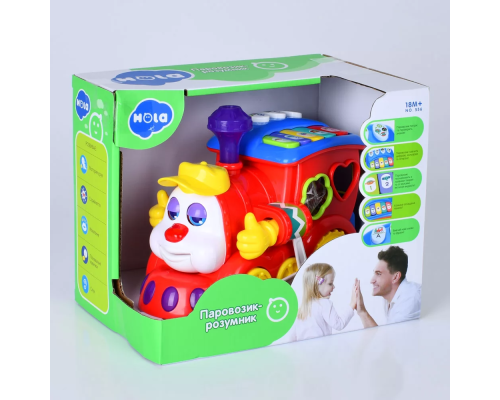 Гра 556 паровоз, сортер, піаніно, муз. (англ.),  їздить, світло, бат., кор., 23,5-16-18 см.