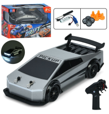 Машина UD3100A радіок.2,4G,акум.,дорож.знаки,дріфт,дод.колеса,USB,2 кольори,світло,кор.,24-16-12,5см