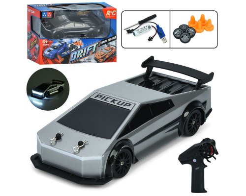 Машина UD3100A радіок.2,4G,акум.,дорож.знаки,дріфт,дод.колеса,USB,2 кольори,світло,кор.,24-16-12,5см